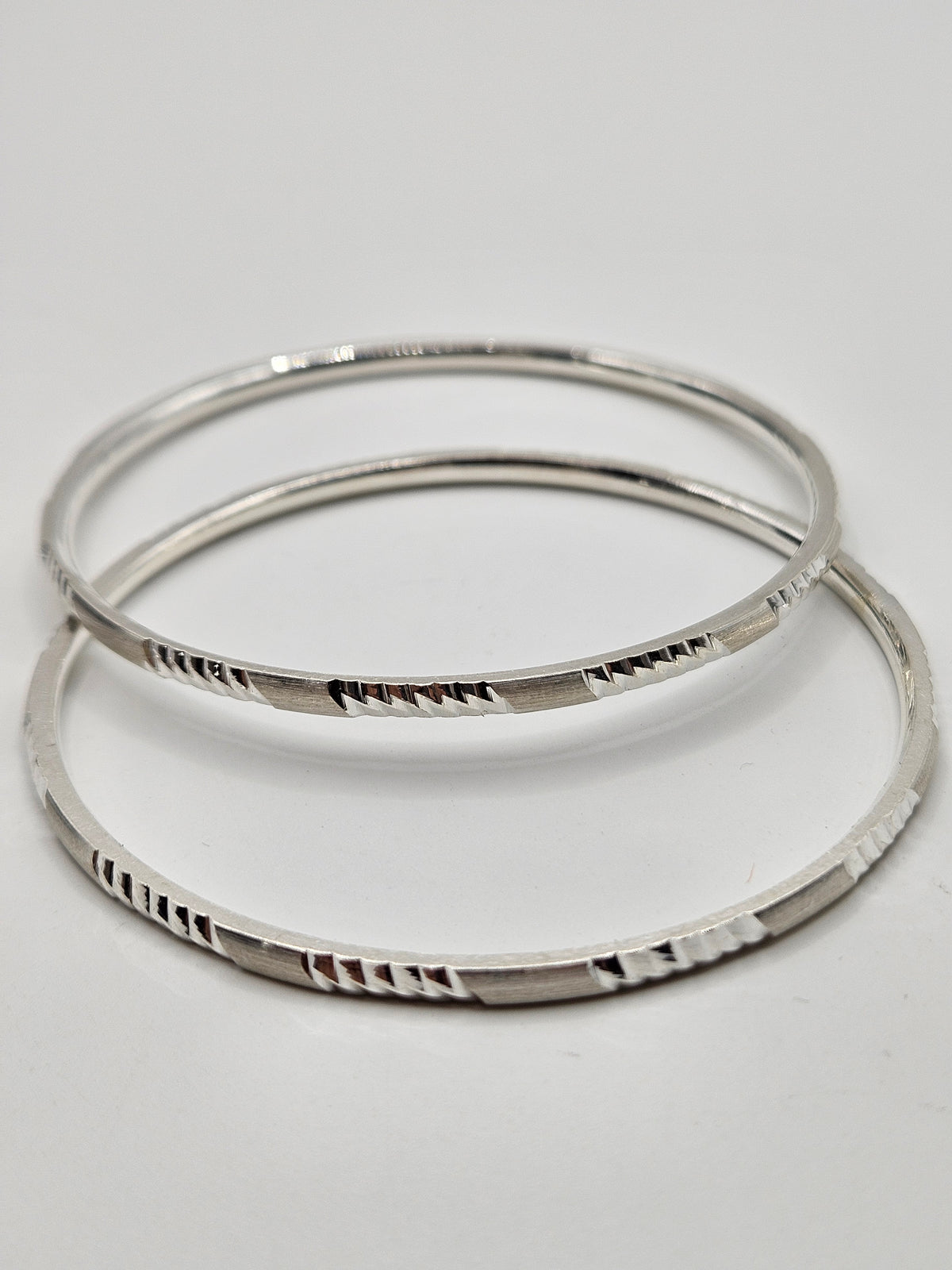 SILVER BANGLES